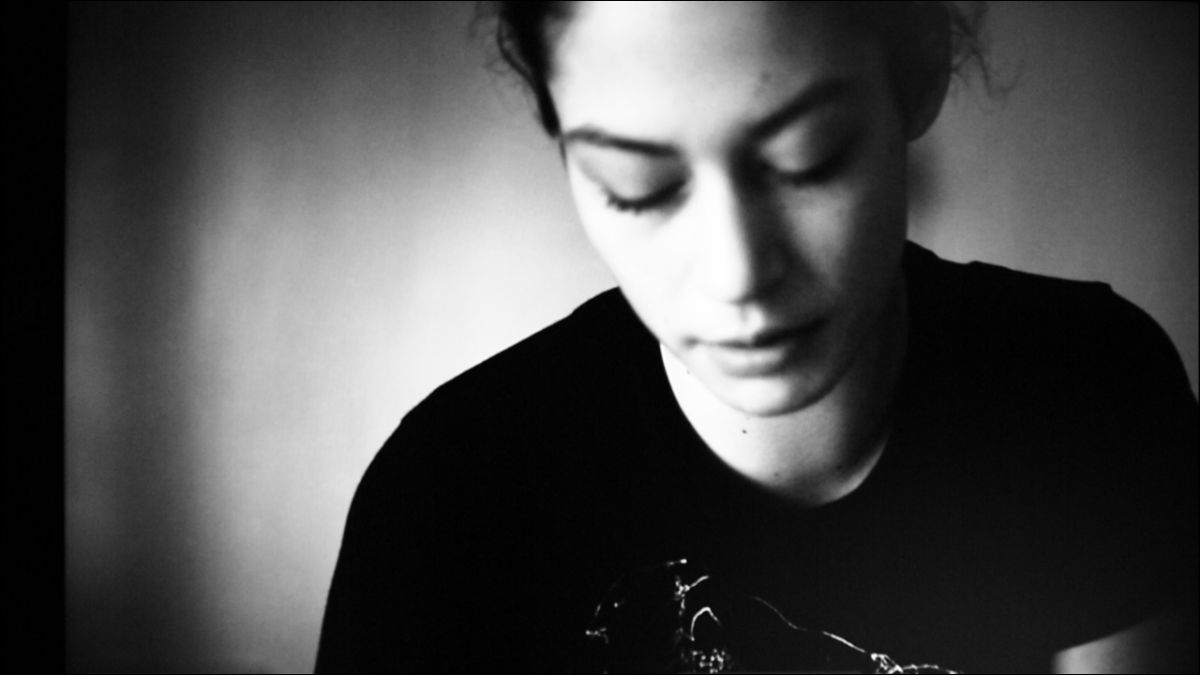 Film still of a woman