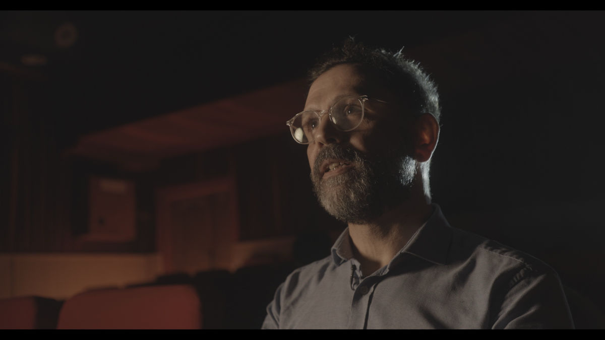Photo of a man wearing glasses