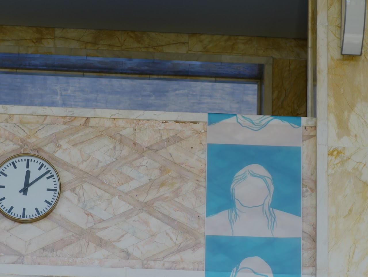 Film still of a notice board